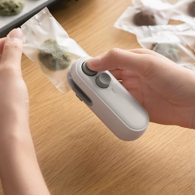 MCOIKY® 2-in-1 Mini Heat Sealer -  Seal & Cutter (C)